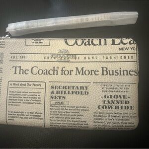 NWT Coach Beige Newspaper Print Pouch